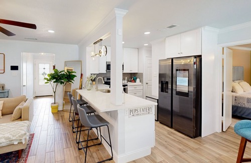 Bedford House | Dog-friendly retreat with oasis yard, amazing pool, tropical bar, & firepit