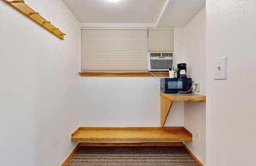 West End Apartment | Dog-friendly room on Main St - pool & hot tub - walk to lifts, ground-floor