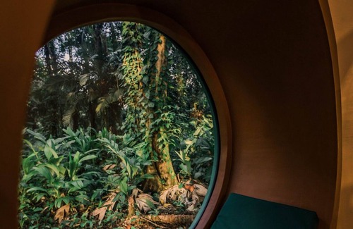 Big Creek House | Dome shaped bungalow in a lush tropical forest, steps away from ocean views.