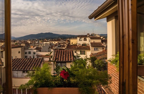 Sant' Ambrogio Apartment | Donati Tower's Loggia: spectacular view of the Duomo, in the heart of Florence