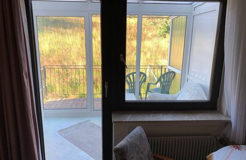 Reichelsheim Cottage | Doppelzimmer mit Wintergarten - 32 - Gasthaus und Pension Zum Fürstengrund