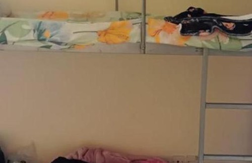 Sharjah House | Dormitory bed space in a shared room