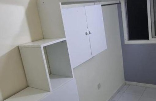 Sharjah House | Dormitory bed space in a shared room