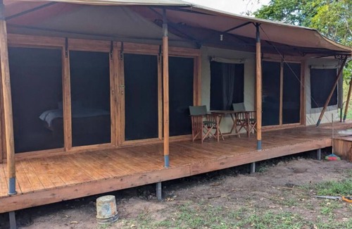 Mikumi House | Double G safaris and Camp Mikumi - Luxury Triple Room 2