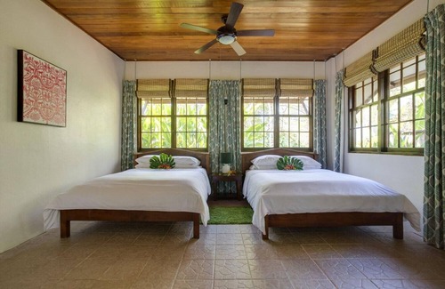Negroman Resort | Double-Queen Casita w/Screened Porch & A/C - Steps to Treehouse Bar