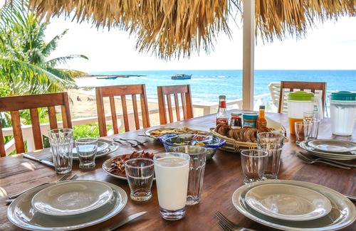 Treasure Beach Villa | Doubloon Villa, large pool and sandy beach at heart of Treasure Beach