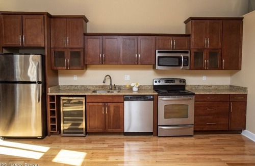 Downtown Louisville Apartment | Downtown Louisville 4th Street LIVE industrial loft!