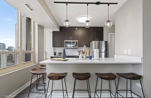 Rush and Division Apartment | Downtown Retreat: 2BR, Balcony, Resort Comfort
