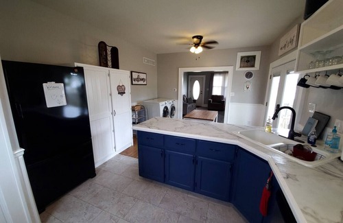 Warrensburg House | Downtown Retreat with large privacy fenced yard. Pet Friendly!