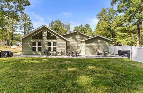 Kendall House | Dual Lakefront Home with Big Yard Hot Tub and Fire Pit