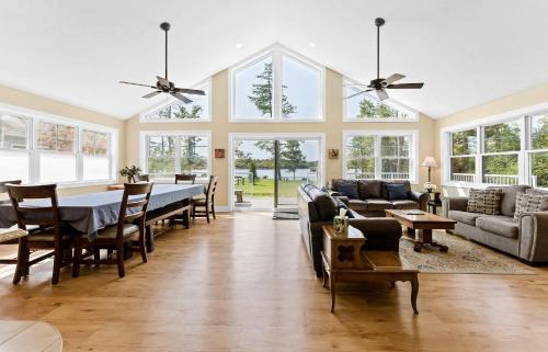 Kendall House | Dual Lakefront Home with Big Yard Hot Tub and Fire Pit