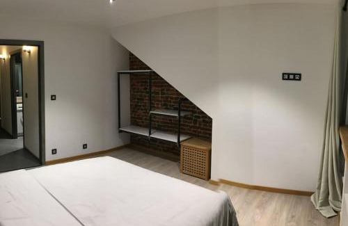 Bertrix Apartment | Duplex style industriel à deux pas de la Place