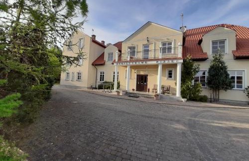 Orlinki Bed & Breakfast | Dworek Bursztynowe Piaski