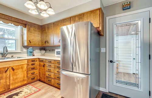 Eagle River House | Eagle River Waterfront Home w/Dock & Fire Pit!