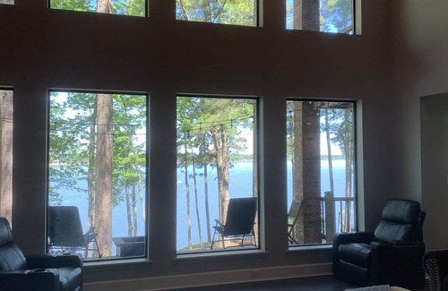 Huntington House | Eagles Point! Incredible Private Waterfront 3.5 acres. Long range water views!