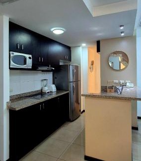 Simon Bolivar Apartment | Ecuabook Torre Sol Family Apartment 901