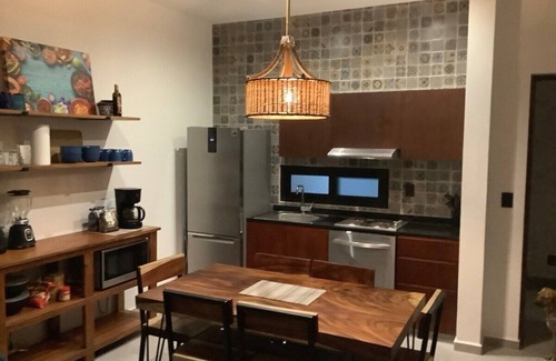 Mario Villanueva Madrid Condo | Elegant 1-Bedroom Retreat w/Rooftop Oasis & Pool