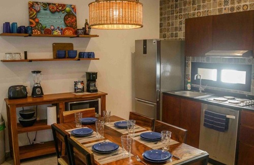 Mario Villanueva Madrid Condo | Elegant 2-Bedroom 2-Bath Retreat with Rooftop Oasis & Pool