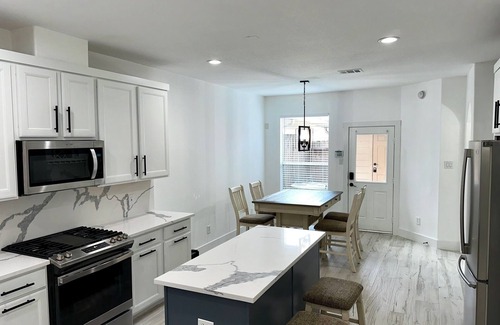 Alden Bridge House | Elegant 3 Bedroom Home in The Woodlands, Texas. The Waterway. Market Street.