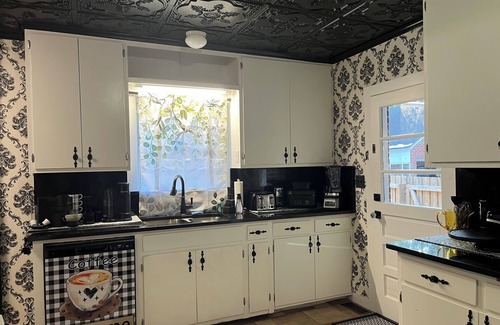Andalusia House | Elegant 4BR 2BA Andalusia retreat with bunk beds, king suite & modern comforts.