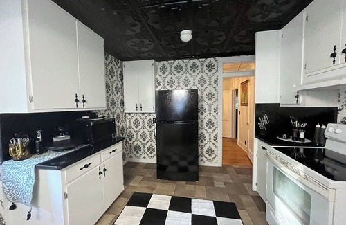 Andalusia House | Elegant 4BR 2BA Andalusia retreat with bunk beds, king suite & modern comforts.
