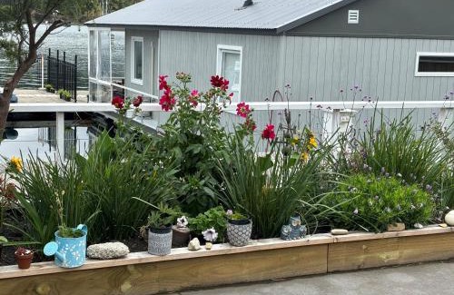 Huon Valley Boat Rental | Elegant and scenic floating boat house