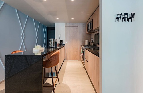 Del Valle Apartment | Elegant Apartment with Balcony and City Views