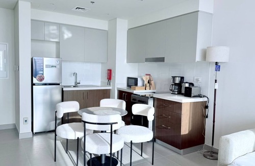 Jadaf Apartment | Elegant Downtown Escape 1BR w/Balcony, Pool & GYM