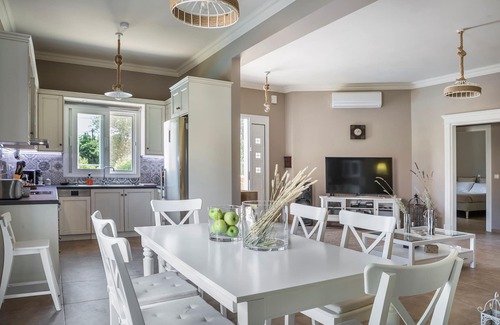 Mazarakata House | Elegant Luxury garden apartment with swimming pool, BBQ and play ground