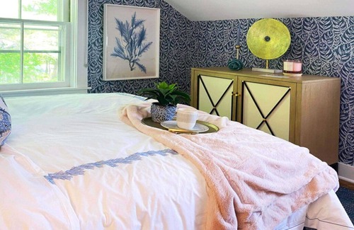 Lenox Bed & Breakfast | Elegant suite with a king bed, fireplace, and kitchenette.