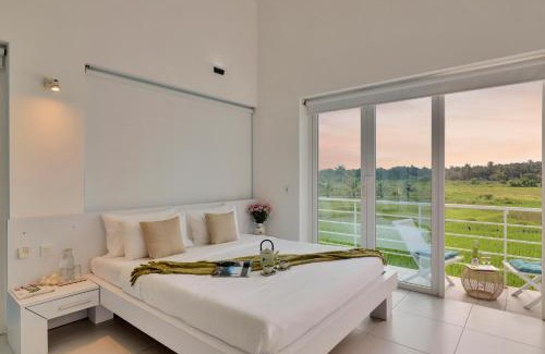 Nerul Villa | ELIVAAS 4 BHK with Pvt Pool & Sunrise or Sunset view - Risaia