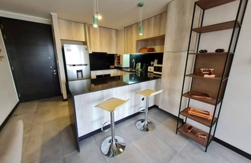 Las Condes Apartment | Encantador y Funcional Apartamento con Parking Pri