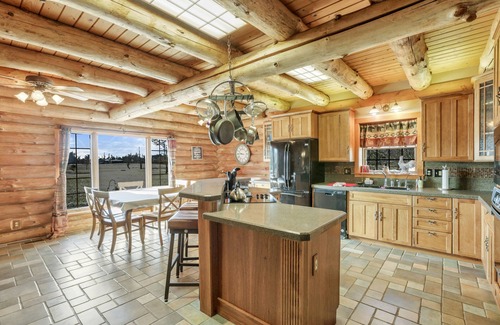 Summit Station Cabin | Enchanted log cabin with lake view