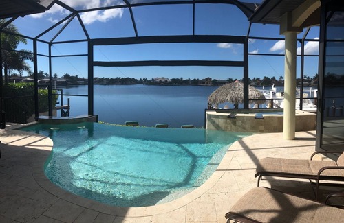 Eight Lakes House | Enjoy Beautiful Sunsets on Brittania Lake with Gulf Access