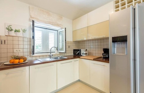 Dubrovnik Apartment | Enjoy beautiful sunset views over Dubrovnik while relaxing in our jacuzzi