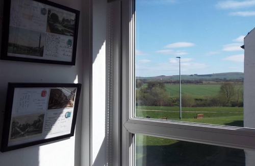 Coldstream Cottage | Enjoy the fantastic river views from Rosybank Cottage, with in 2 bedrooms each with with smart ensui