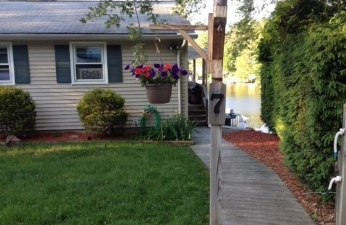 Holland House | Enjoy the Fun of a Lakefront GetAway, While Only Minutes from Local Attractions!