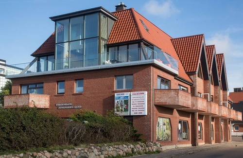 Wittduen Apartment | Enjoy the view of the sandbanks and the Wadden Sea, the boats and the beach.