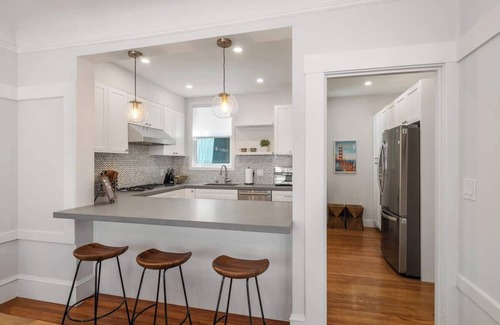 Richmond District Apartment | Enjoy ultra convenient City living from this comfortably stocked and furnished two level home