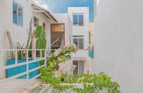 Zona Colonial Apartment | Enriquillo 2-bdrm apt with ensuite baths, full kitchen, and cozy living room.