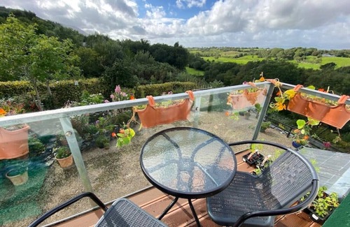 Westport Apartment | Entire studio with balcony and riverside decking.