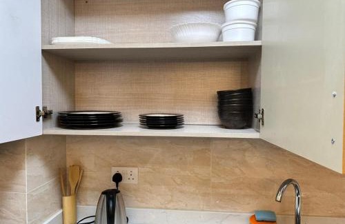 Nairobi West Apartment | Enzi Heights Apartments - Cozy 1 bedroom near Eka Hotel, Pool, Gym, Lift