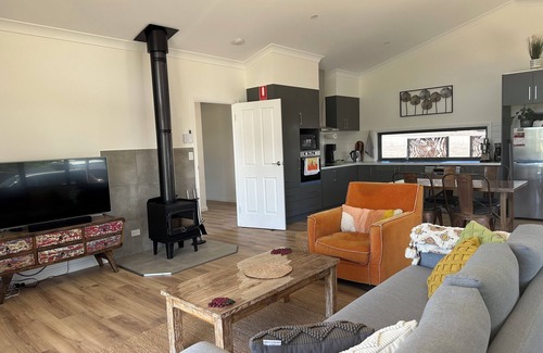 Upper Wakefield House | Ernie's Acre, sit back and relax in this calm, stylish space, pet friendly.