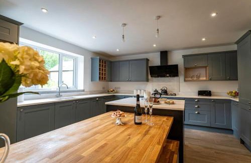 Farley House | Errwood, woodland lodge with hot tubs for 14
