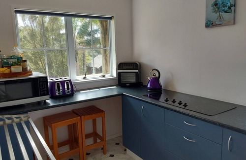 Kennedy Bay Apartment | Escape the rush in this gorgeous slice of hidden paradise.