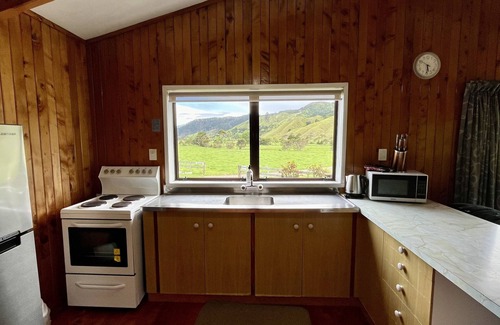 Colville House | Escape to the Countryside: Enjoy Free WiFi at Our Cozy Farm Stay Cottage!