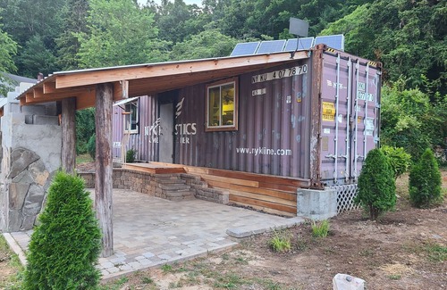 Millers Creek House | Escape to the NC Mountainside and stay in this unique Container home