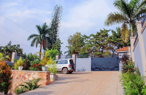 Bukoto House | Escape to Tranquility. A homely place close to everything but hidden from view.