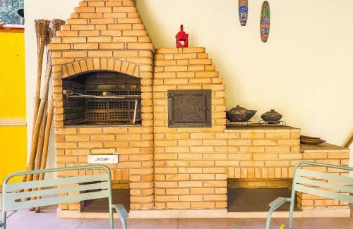 Carapicuiba House | Espaço gourmet e home-office na Granja