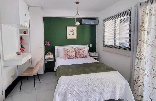 Saude Apartment | Estudio Green Loadd